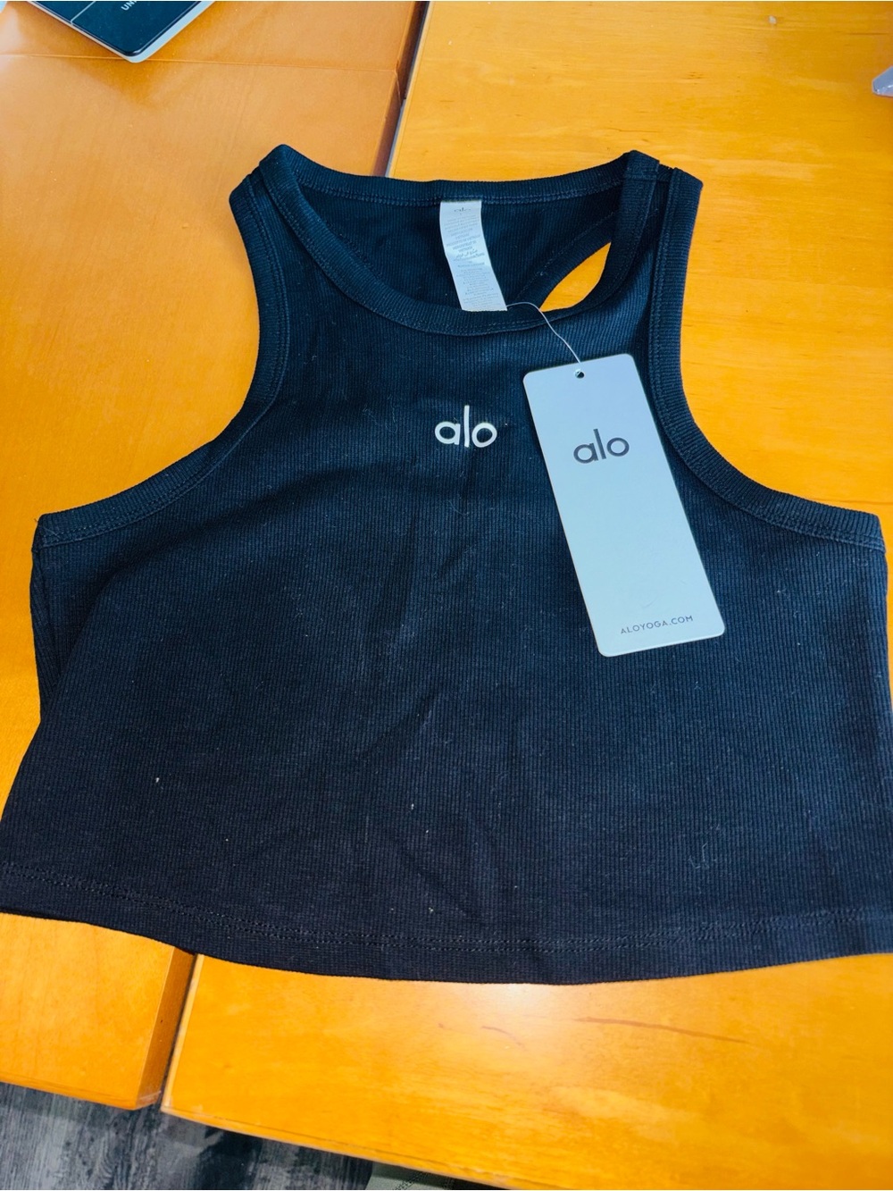 Alo Black Ribbed Crop Tank with Center Logo